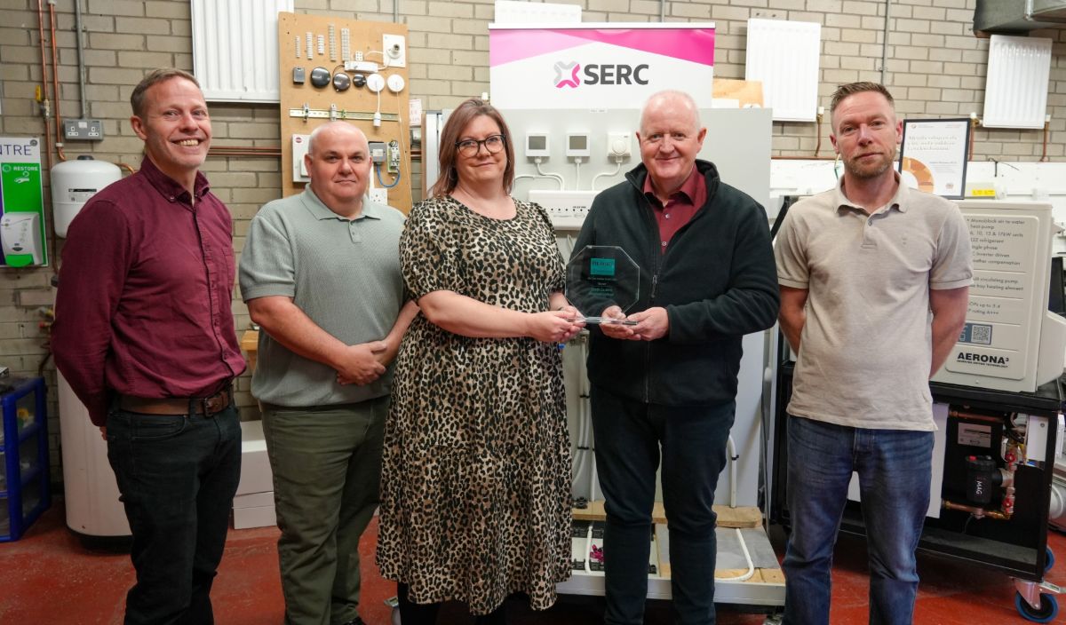 Picture of SERC Business Support team members holding an ESG Awards trophy